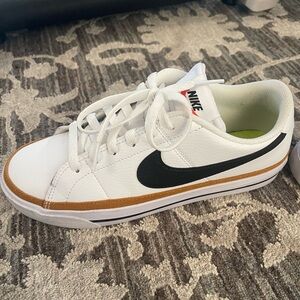 Nike women’s white and Black Sneakers with Tan Accents